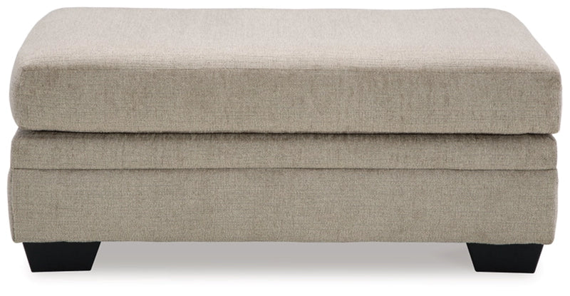 Stonemeade Sofa Chaise, Chair, and Ottoman in Taupe